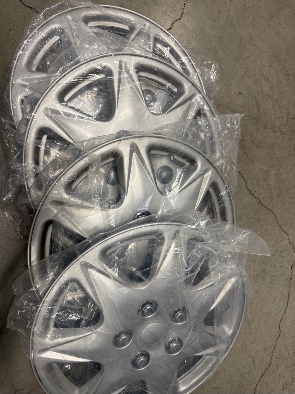 Silver Wheel Cover Set (4-Pack) -Hub Caps fits standard 15" wheels.